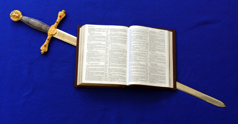 Open Bible over a sword.
